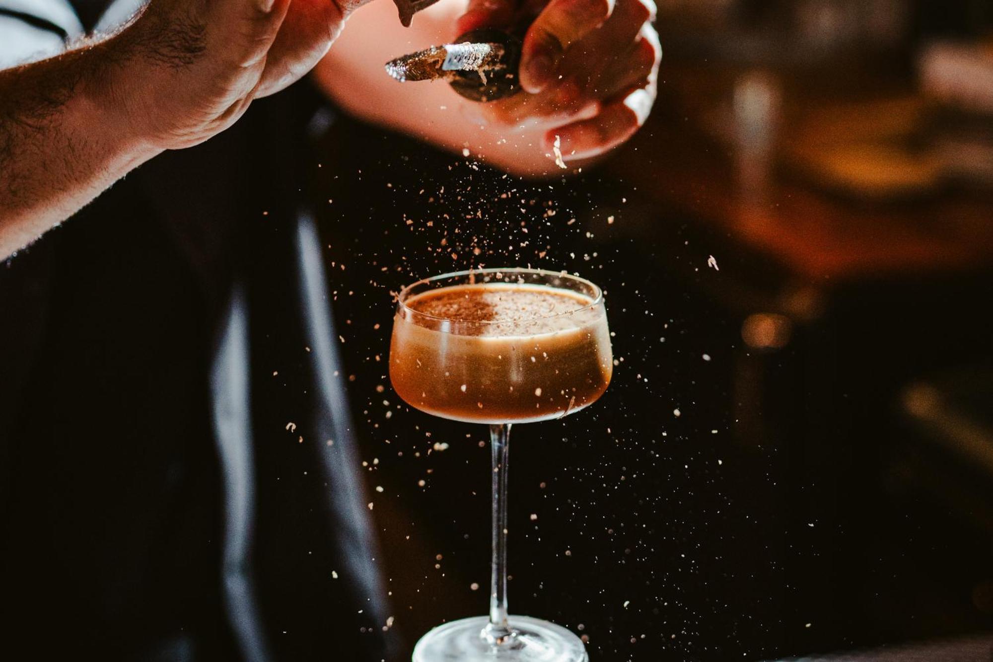 Vignette Collection Yours Truly Dc By Ihg Washington Bagian luar foto A bartender dusting a cocktail with ground nutmeg